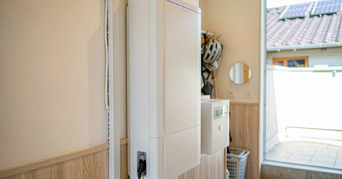 LiFePO4 home battery and smart meter in a European utility room ready for peer-to-peer energy trading 2026